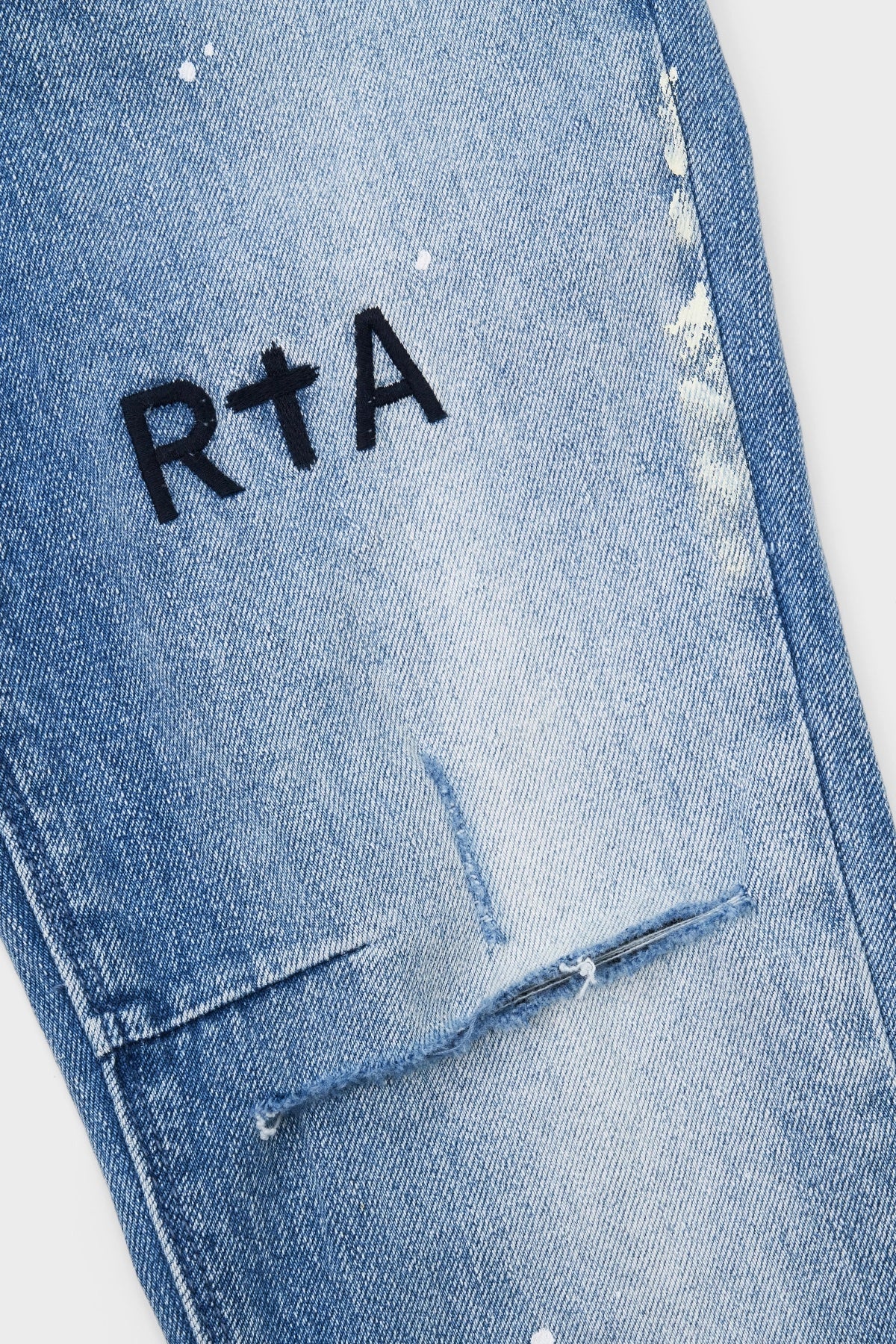 CLAYTON SKINNY JEAN | DISTRESSED WHITE PAINT