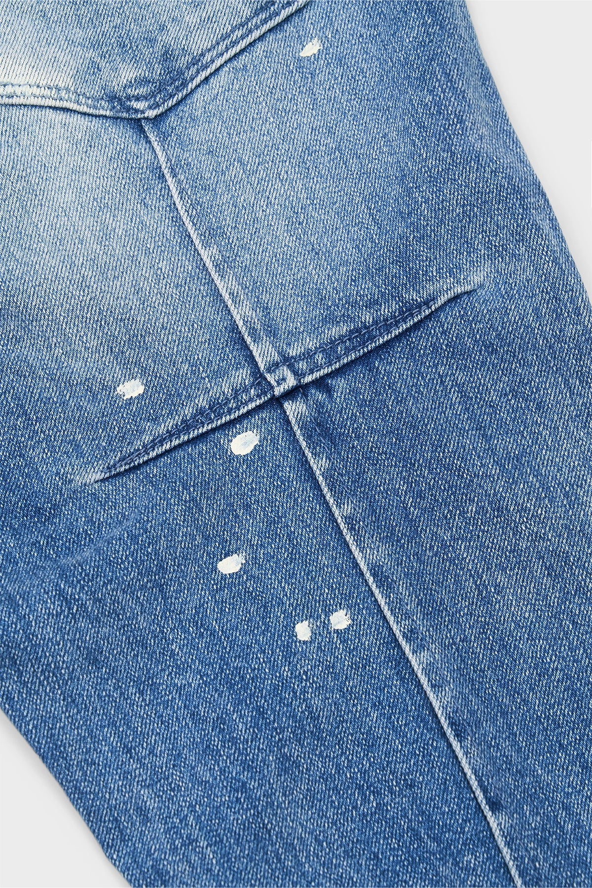 CLAYTON SKINNY JEAN | DISTRESSED WHITE PAINT