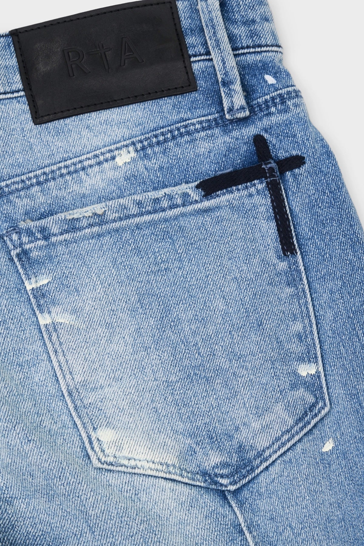 CLAYTON SKINNY JEAN | DISTRESSED WHITE PAINT